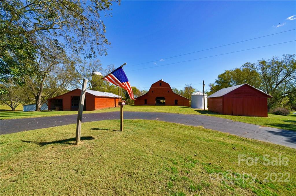4648 Crouse Road Crouse, NC 28033 - Photo 2 of 26 a backyard of a house with lots of green space