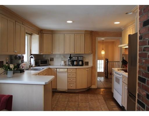 34 Great Rock Road Sherborn, MA 01770 - Photo 14 of 17 a kitchen with stainless steel appliances granite countertop a stove a sink a refrigerator and white cabinets
