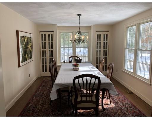 34 Great Rock Road Sherborn, MA 01770 - Photo 16 of 17 a view of a dining room with furniture window and outside view