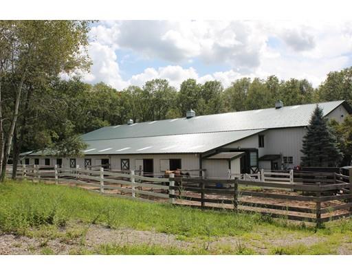 34 Great Rock Road Sherborn, MA 01770 - Photo 10 of 17 a backyard of a house with yard table and chairs