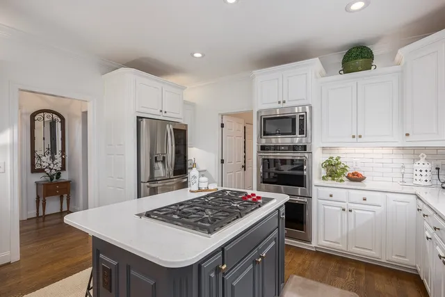 a utility room with sink dryer and washer