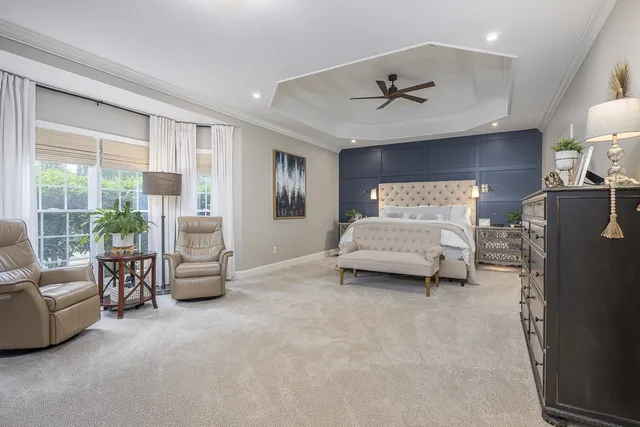 a view of a livingroom with furniture and a flat screen tv