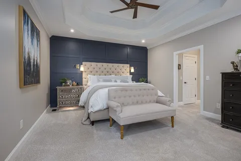 a view of room with furniture and wooden floor