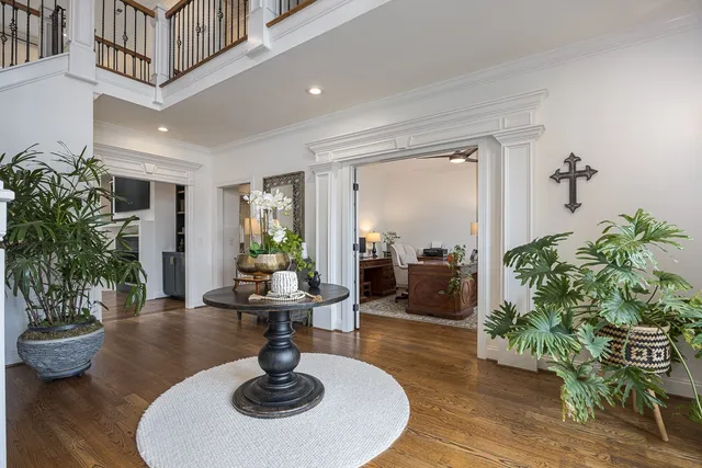 a dining room with a table and chairs