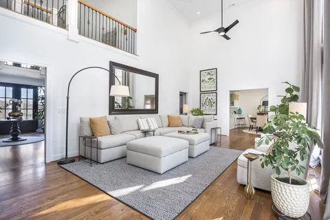 a dining room with a table and chairs