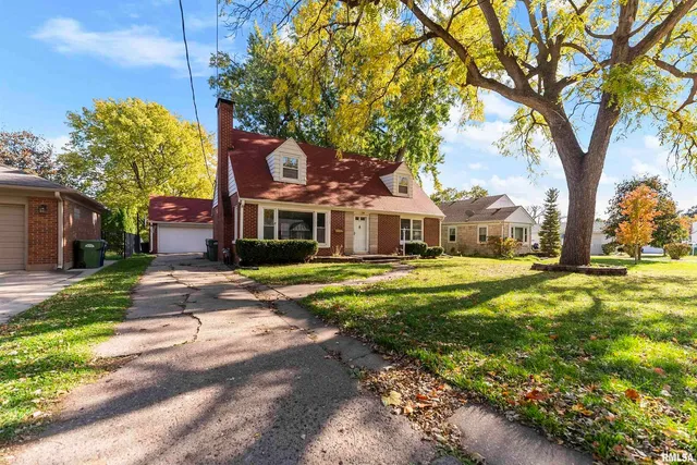 a house with trees in front of it