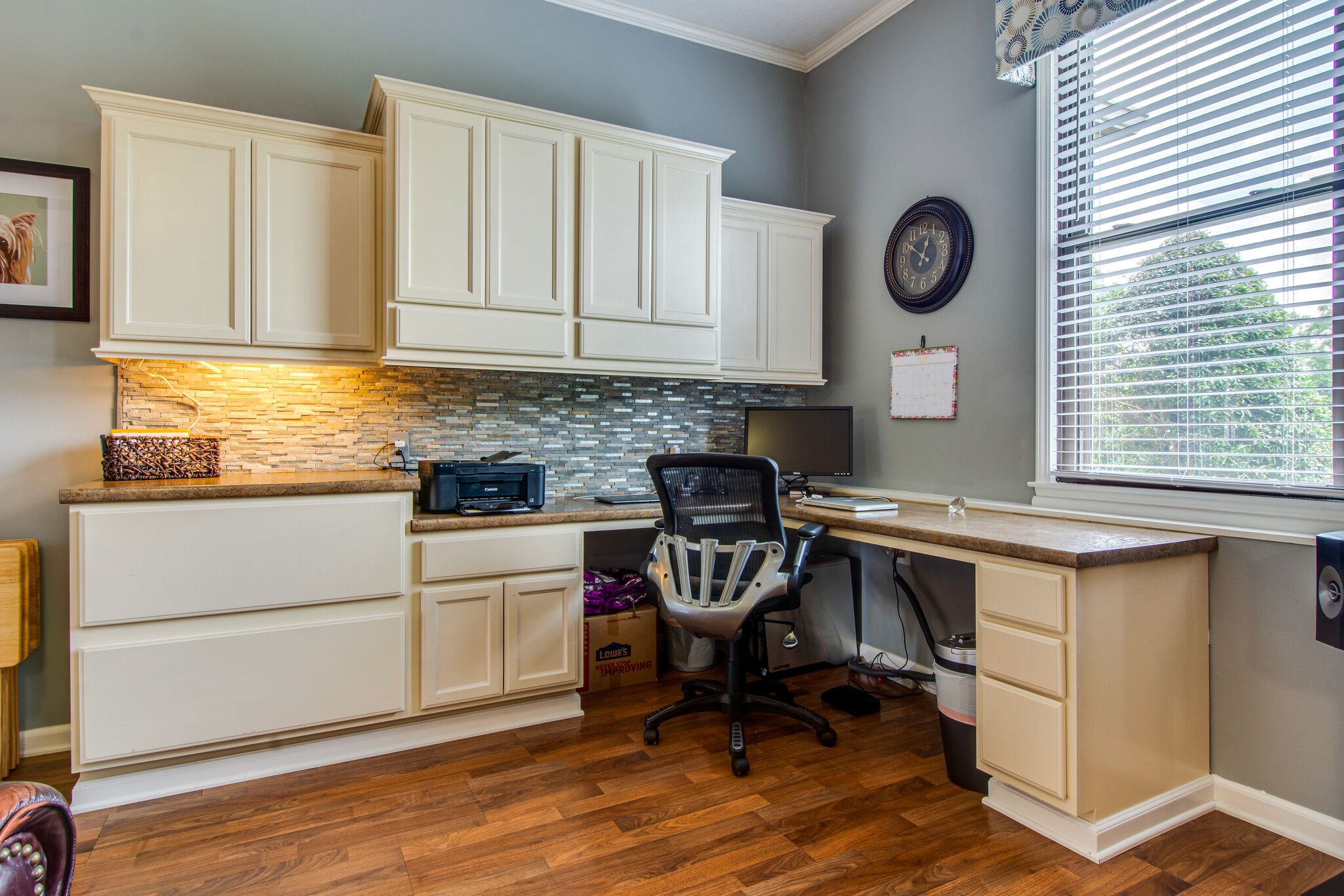 5175 Hickory Ridge Road Lebanon, TN 37087 - Photo 19 of 49 a room with a chair a stove a clock and a window