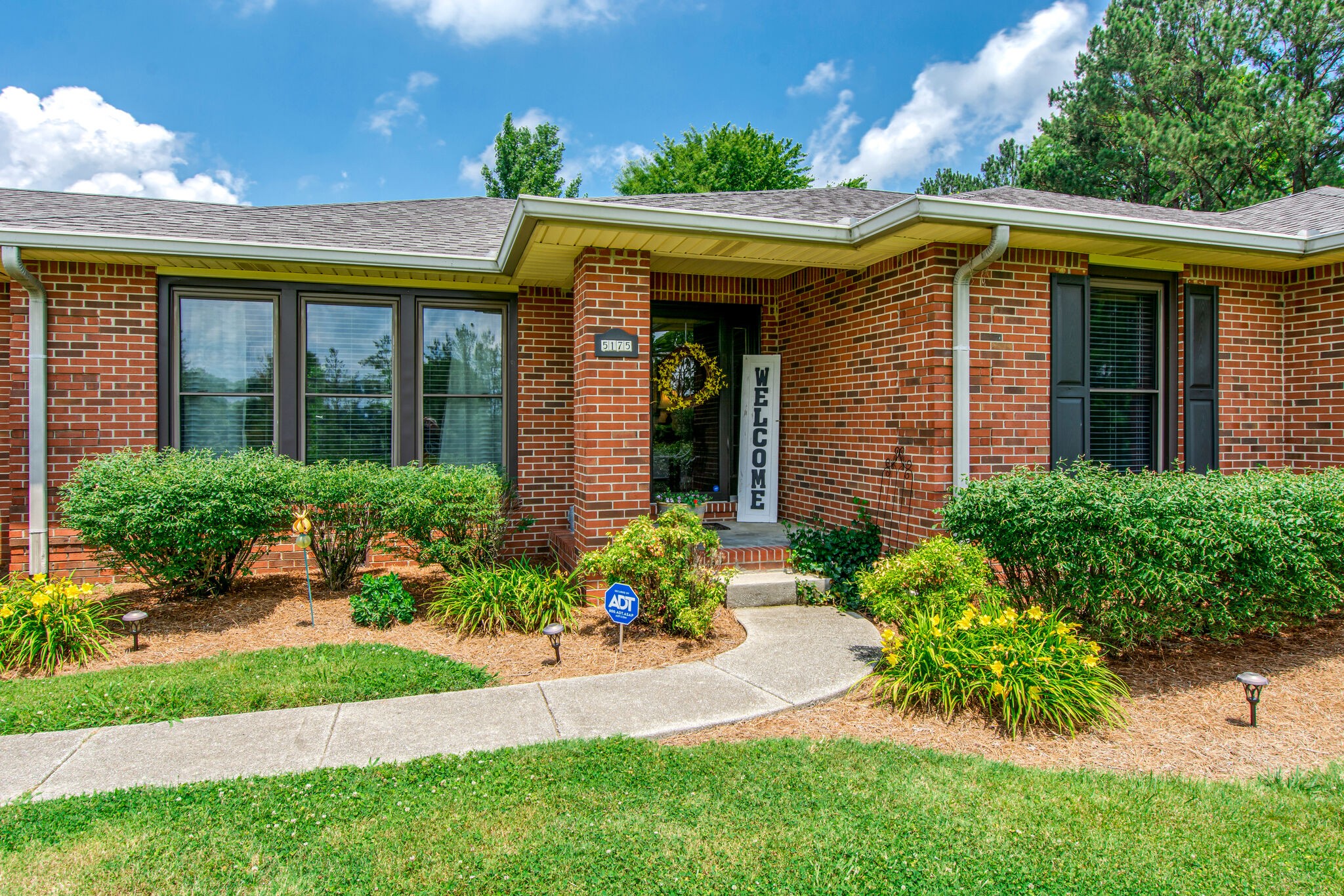 5175 Hickory Ridge Road Lebanon, TN 37087 - Photo 4 of 49 a front view of a house with a yard