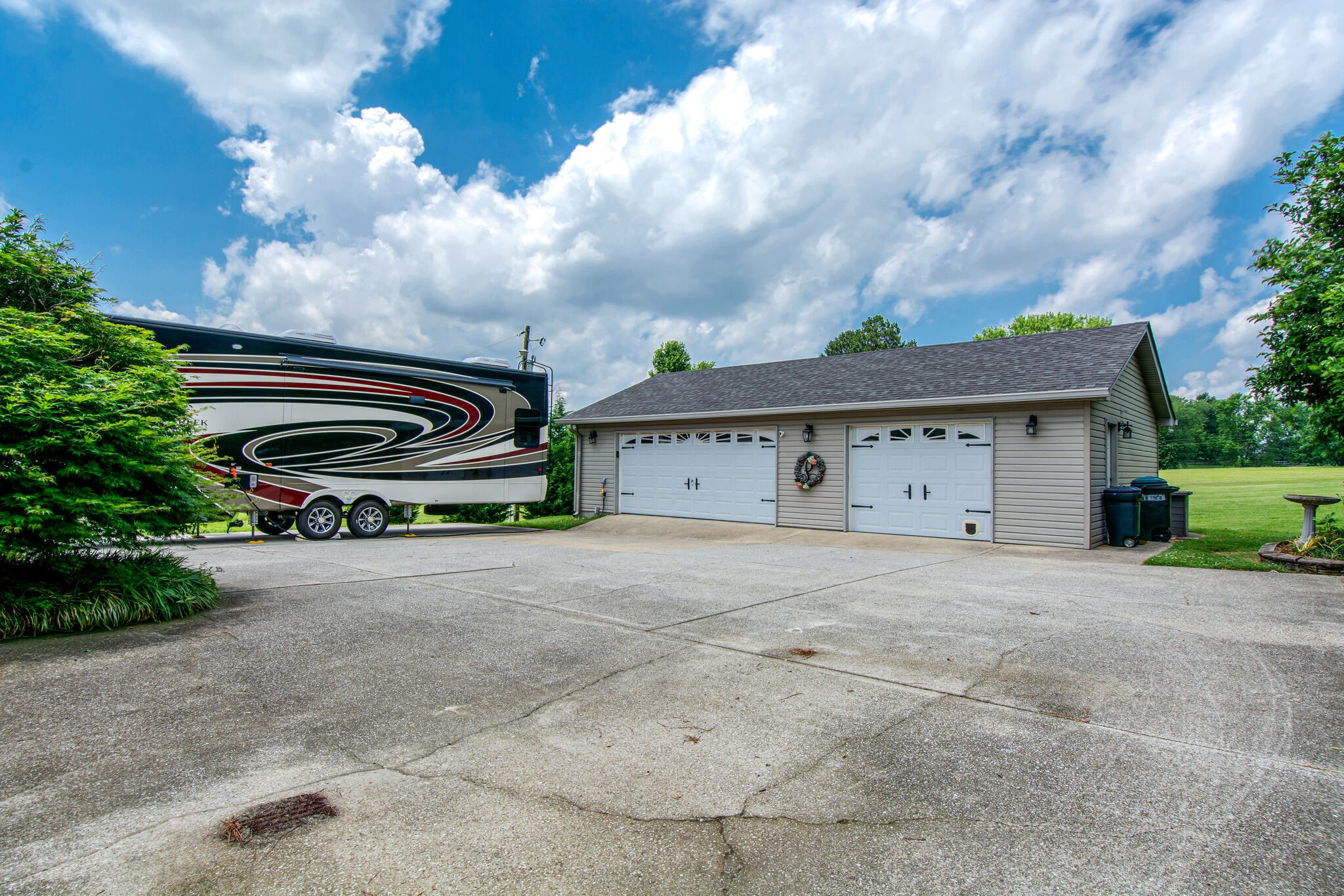 5175 Hickory Ridge Road Lebanon, TN 37087 - Photo 41 of 49 a front view of a house with a yard and garage