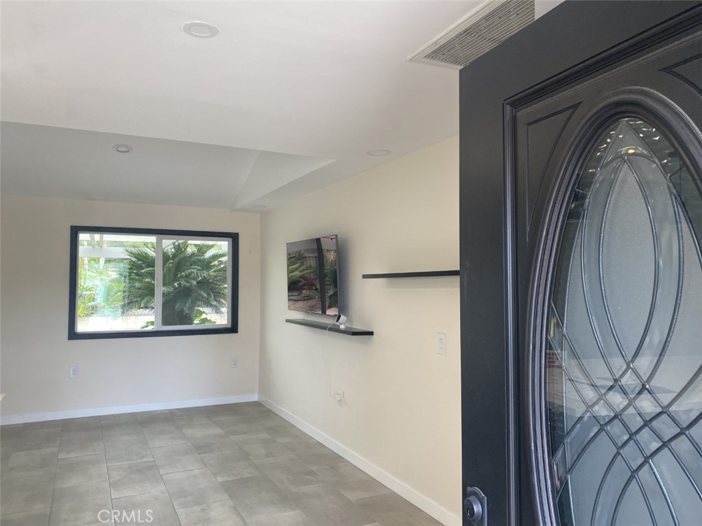 5591 Vallecito Avenue Westminster, CA 92683 - Photo 15 of 37 a view of a livingroom with a large window