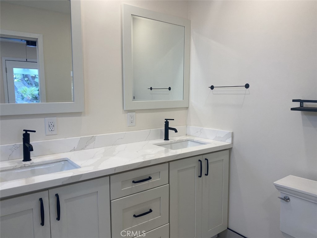 5591 Vallecito Avenue Westminster, CA 92683 - Photo 20 of 37 a bathroom with a sink and a toilet