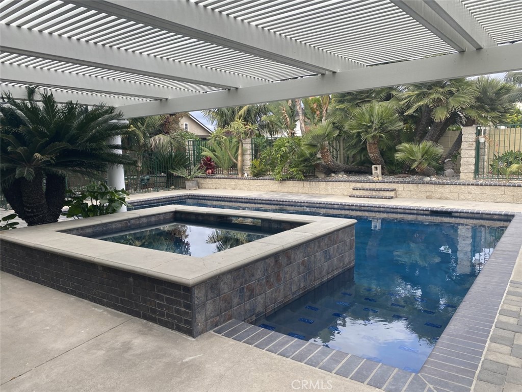5591 Vallecito Avenue Westminster, CA 92683 - Photo 26 of 37 a view of a swimming pool with a patio
