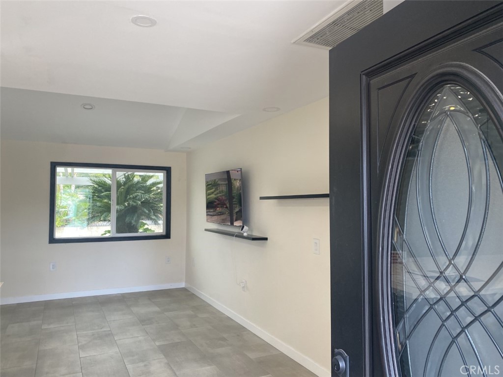 5591 Vallecito Avenue Westminster, CA 92683 - Photo 7 of 37 a view of a livingroom with washer and dryer