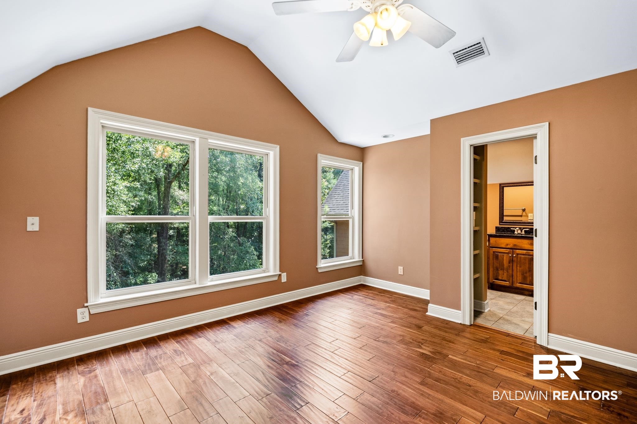 8321 Dixon Road Bay Minette, AL 36507 - Photo 45 of 79 Unfurnished bedroom with ceiling fan, wood-type flooring, and multiple windows