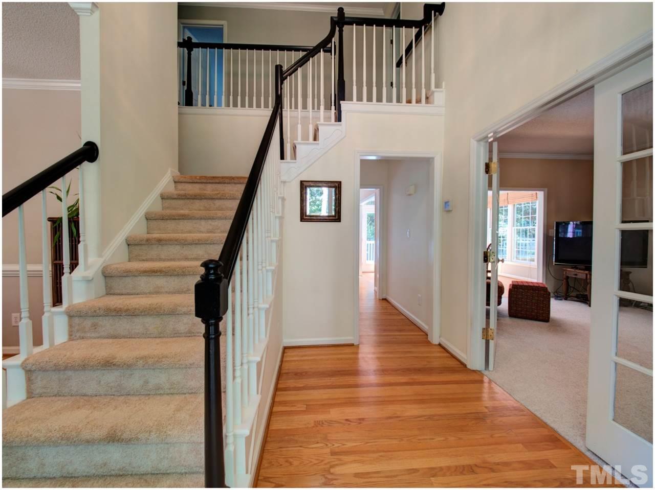 5709 Glenfiddich Way Raleigh, NC 27613 - Photo 3 of 25 Open, two-story foyer with tons of natural light.