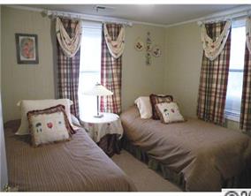 19226 Lahaina Lane Fort Mill, SC 29708 - Photo 12 of 13 a bedroom with a bed and a window