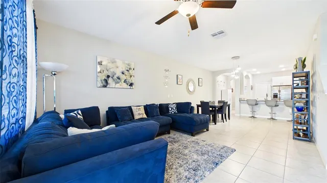 a living room with furniture and a couch