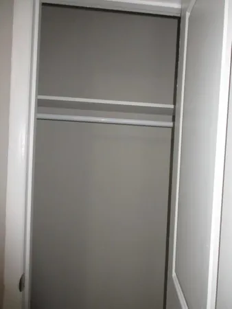 a close up view of racks on the wall