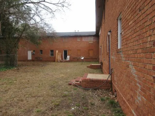 a view of a back yard of the house