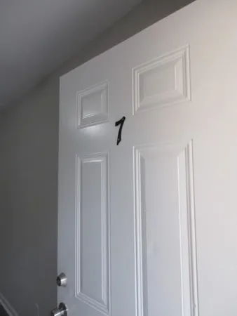 a view of hallway with closet