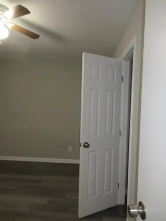 a view of room with hardwood floor