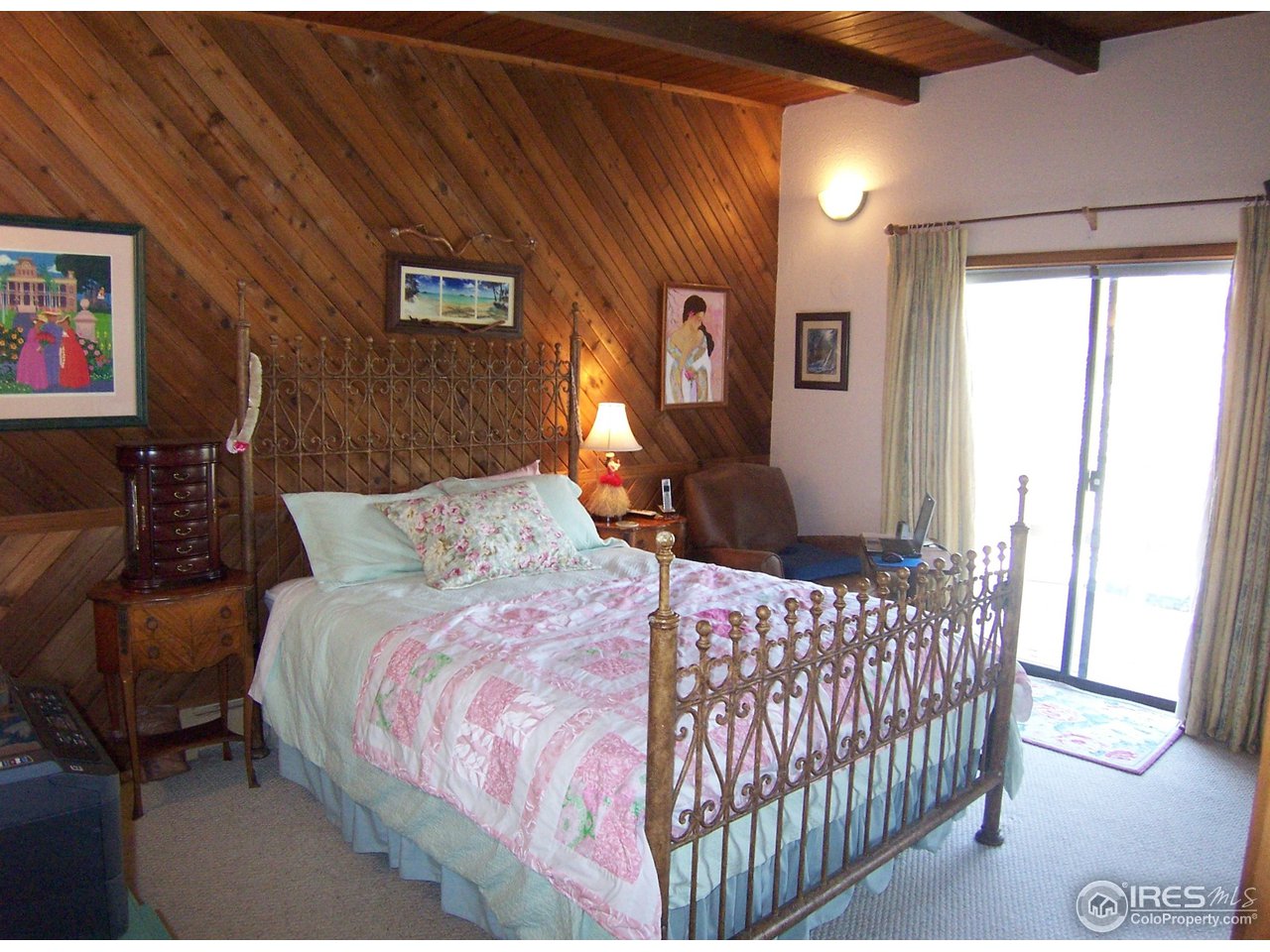 6419 Olde Stage Road Boulder, CO 80302 - Photo 12 of 21 a bedroom with a bed and window