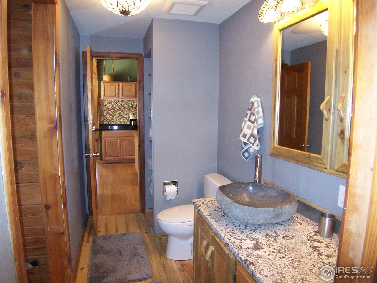 6419 Olde Stage Road Boulder, CO 80302 - Photo 15 of 21 a bath room with toilet and shower