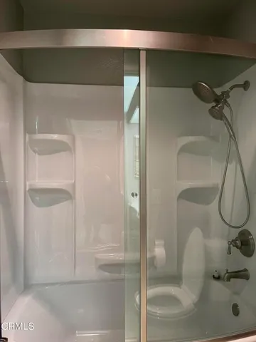 a view of a pathway both side of yard