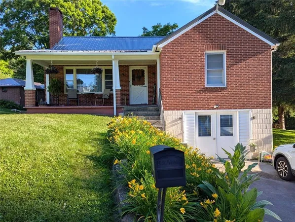 front view of house with a yard