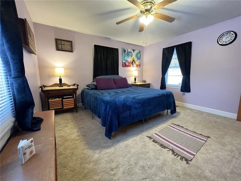 116 Old Rte 219 Salisbury, PA 15558 - Photo 9 of 20 a bedroom with a bed and a chandelier