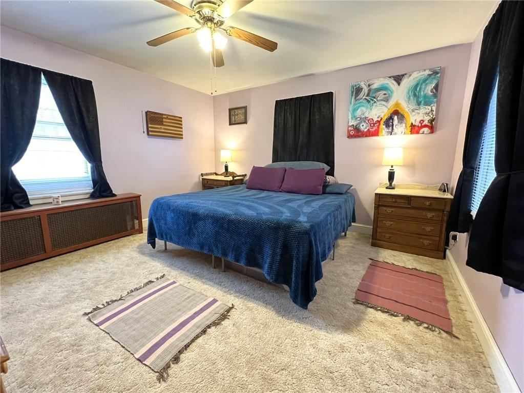 116 Old Rte 219 Salisbury, PA 15558 - Photo 10 of 20 a bedroom with a bed and a chandelier