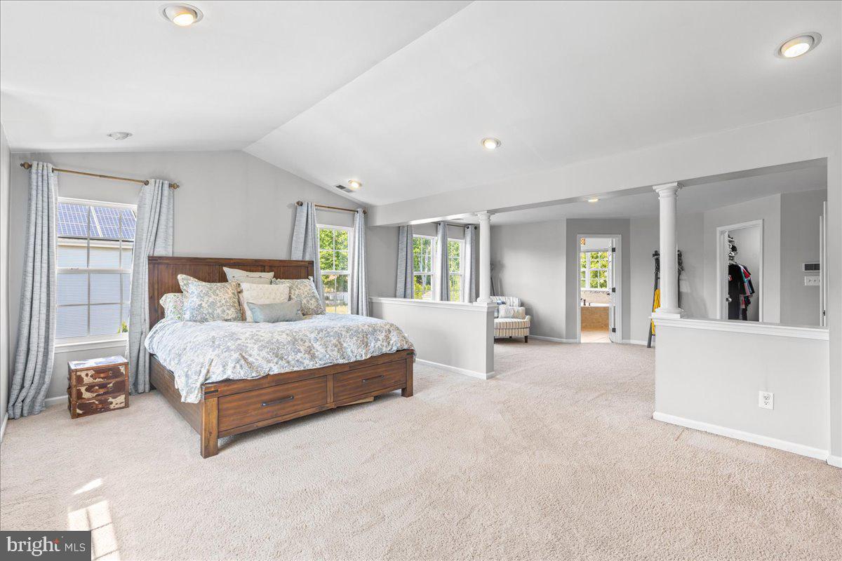 2650 Valhalla Road Vineland, NJ 08361 - Photo 29 of 49 a spacious bedroom with a bed and a couch