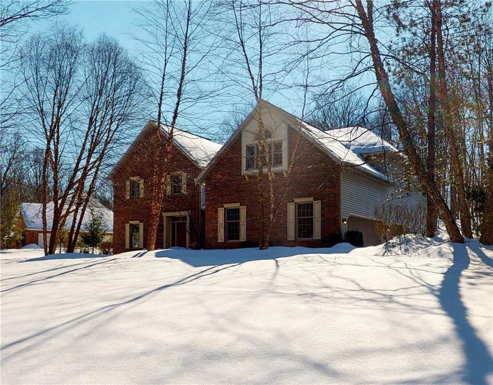 a view of a house covered in snow