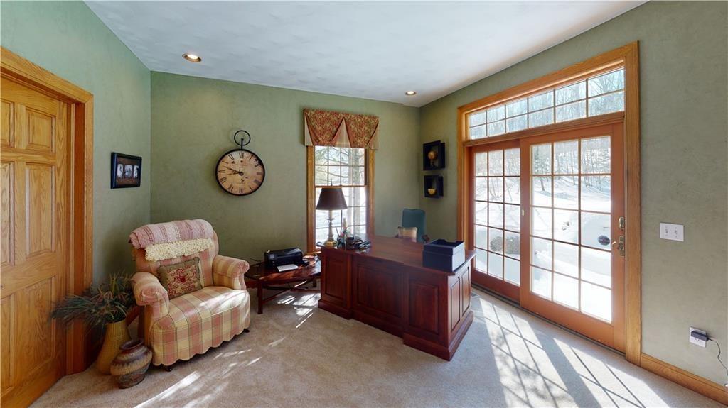 8271 Prindle Road Erie, PA 16510 - Photo 11 of 25 a living room with furniture and a large window