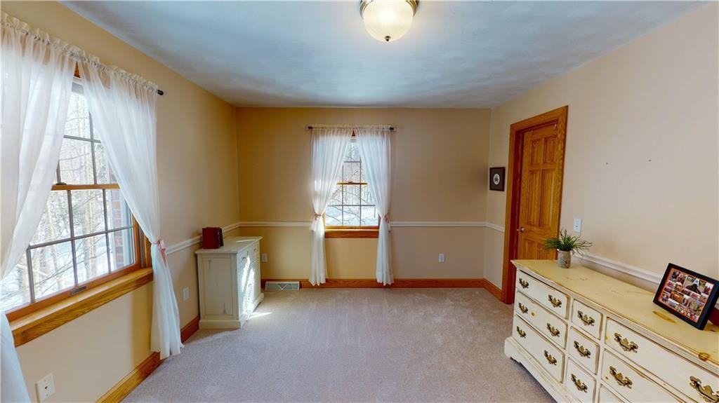 8271 Prindle Road Erie, PA 16510 - Photo 20 of 25 a view of room with window and furniture