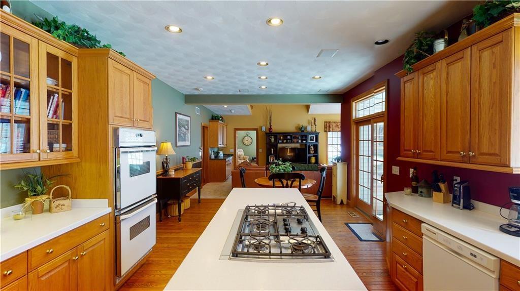 8271 Prindle Road Erie, PA 16510 - Photo 5 of 25 a large kitchen with stainless steel appliances granite countertop lots of counter top space