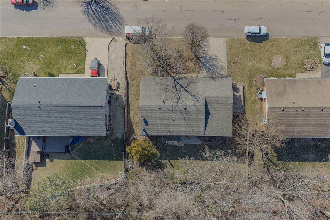 6300 Carnation Road Dayton, OH 45449 - Photo 32 of 35 This bird's-eye view captures a residential property with a neatly maintained yard and ample outdoor space.