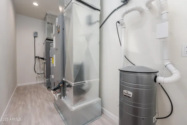 a bathroom with a sink and mirror