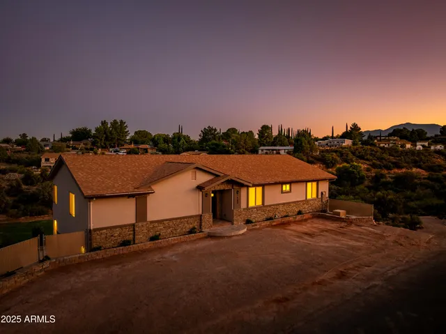 an aerial view of residential houses and street