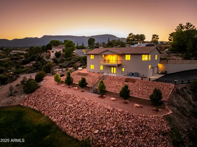 a view of a town with barn house