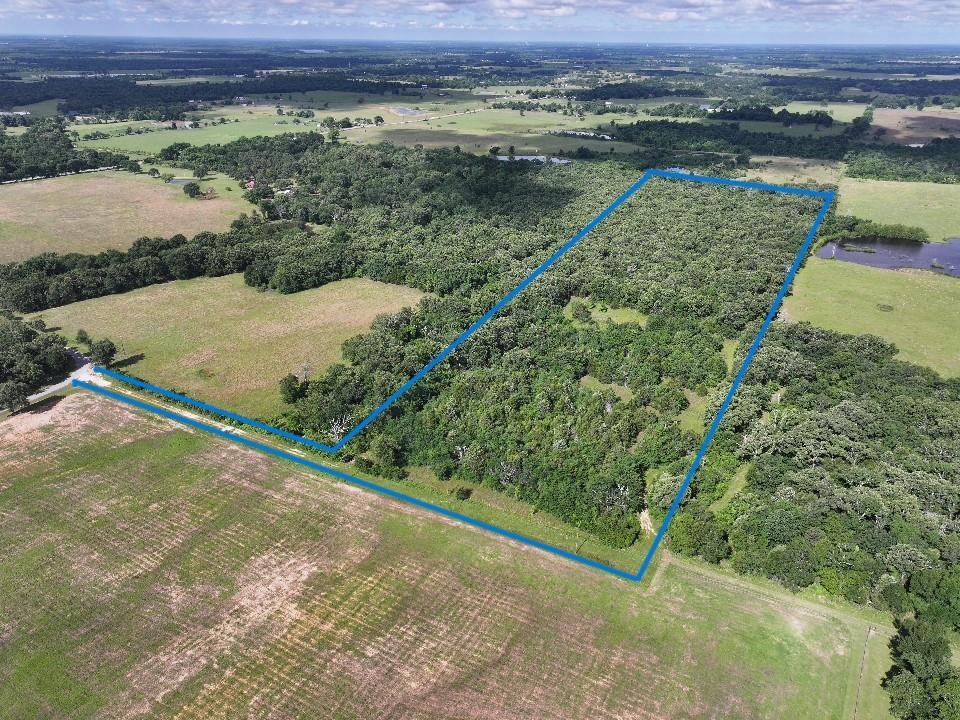 760 County Road, Unit 2315 Eustace, TX 75124 - Photo 1 of 19 a view of a back yard of a house
