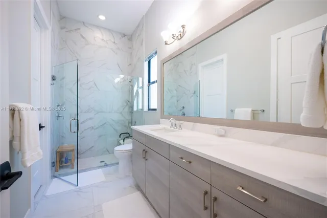 a view of a swimming pool with an outdoor space and seating area