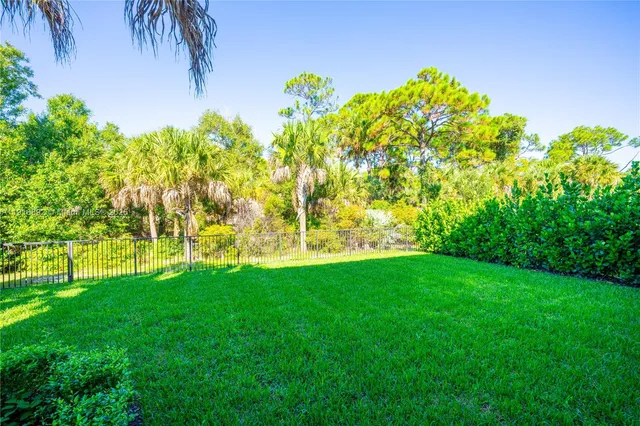 a spacious bathroom with a sink a toilet and shower