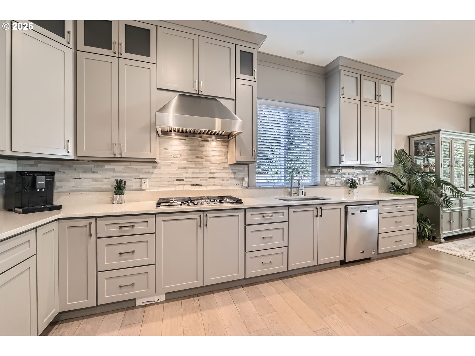 14880 Southeast Anderson Road Damascus, OR 97089 - Photo 11 of 45 a kitchen with granite countertop a sink stainless steel appliances and cabinets