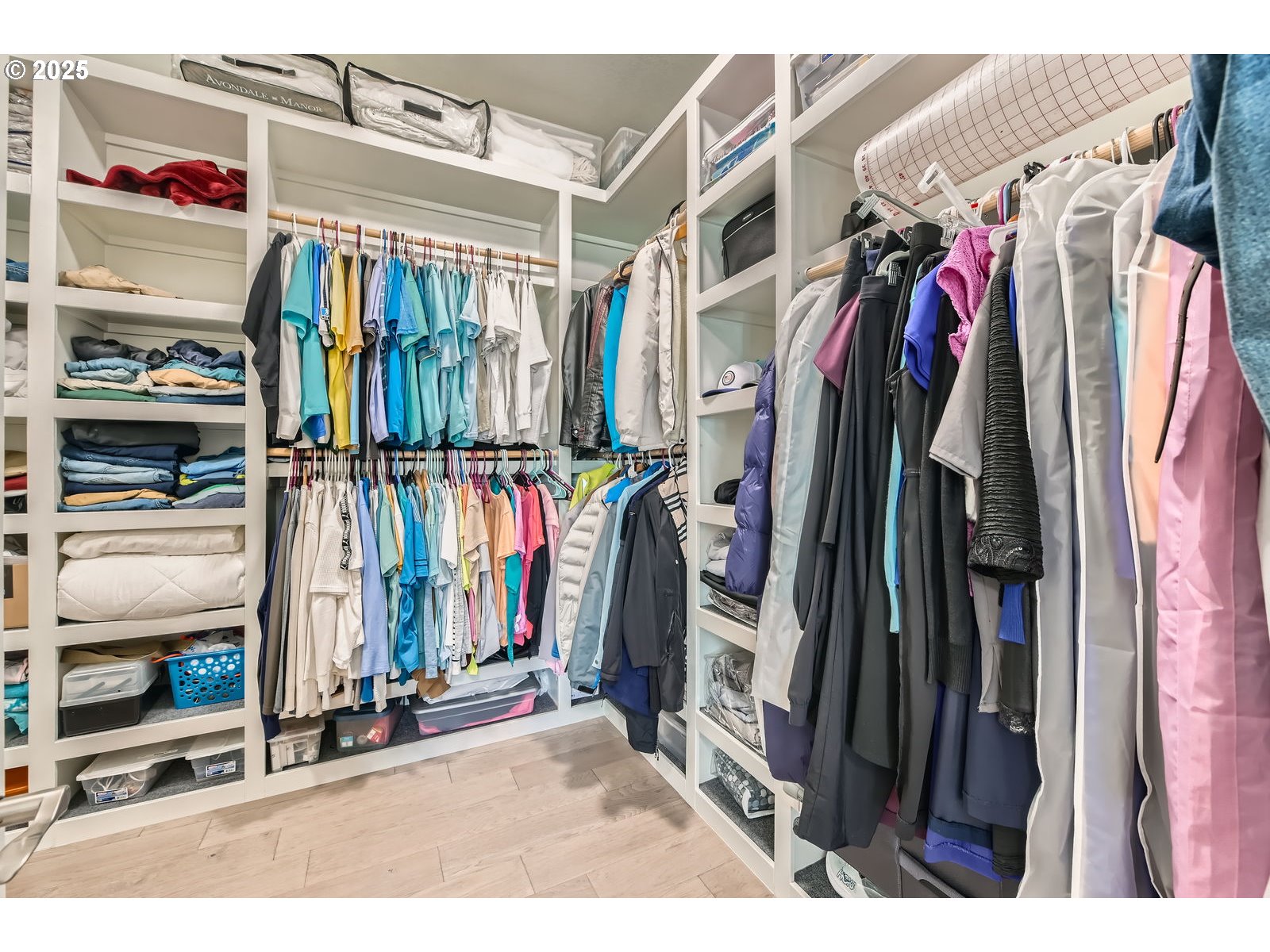 14880 Southeast Anderson Road Damascus, OR 97089 - Photo 16 of 45 a view of walk in closet with clothes