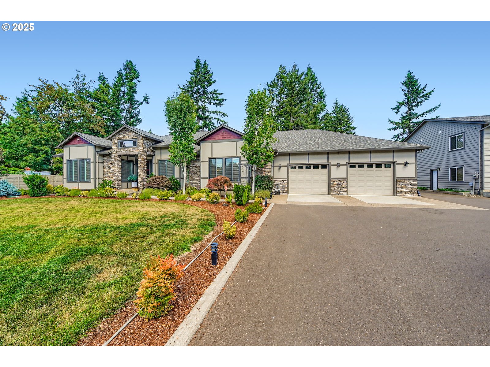 14880 Southeast Anderson Road Damascus, OR 97089 - Photo 38 of 45 a house view with a garden space