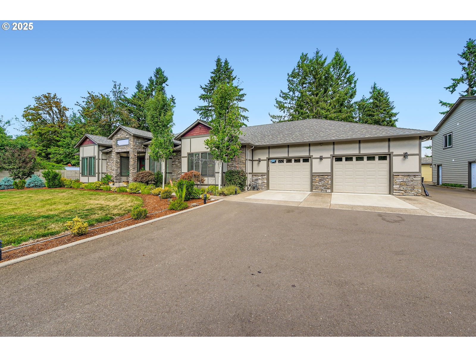 14880 Southeast Anderson Road Damascus, OR 97089 - Photo 42 of 45 a house view with a garden space
