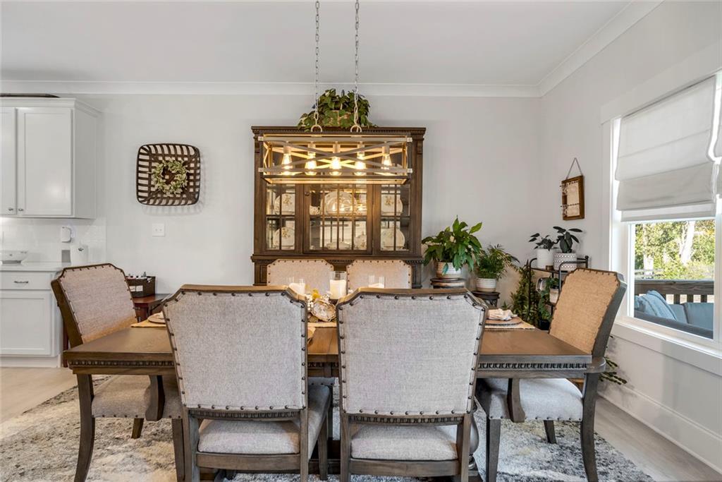 564 Old Airport Road Commerce, GA 30530 - Photo 11 of 39 a view of a dining room with furniture window and outside view
