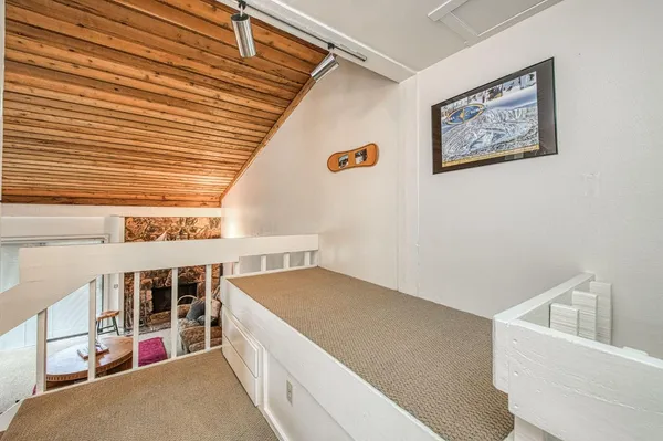 a view of a hallway with front door