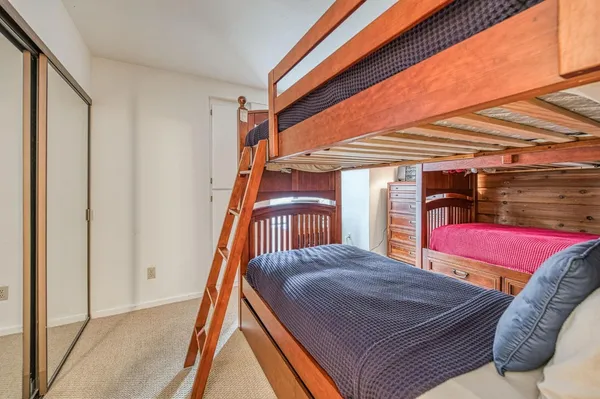 a balcony view with a bed